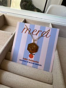 Médaille merci